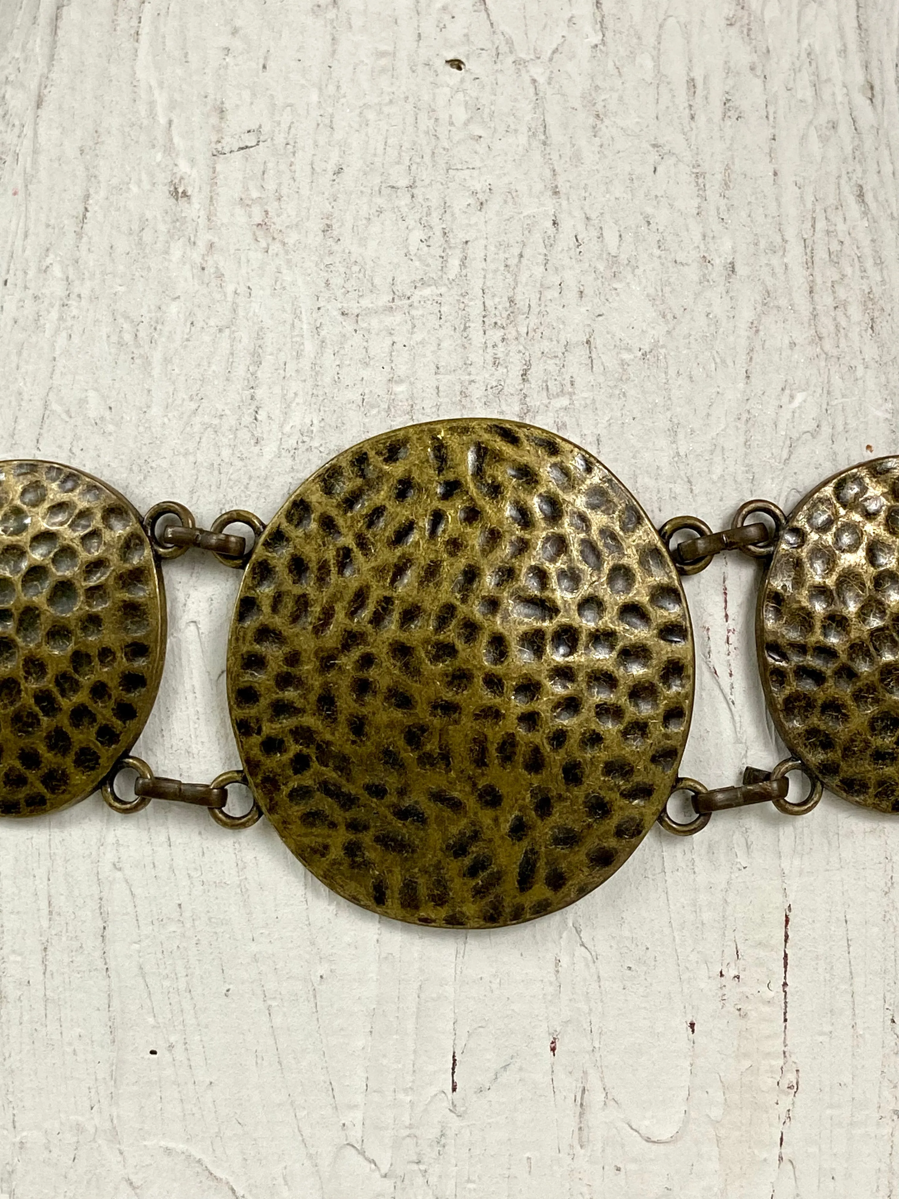 Bronze hammered circle belt